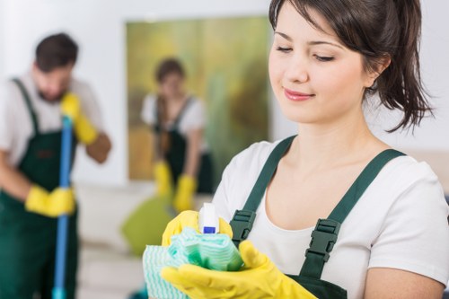 A cleaner working in a managed apartment building near Swiss Cottage