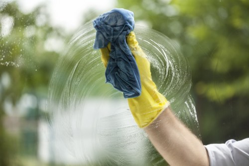 Technician cleaning carpets in a Swiss Cottage apartment building