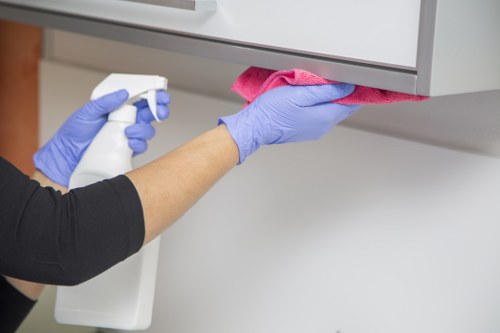 Local commercial cleaners handling floor care in a busy premises